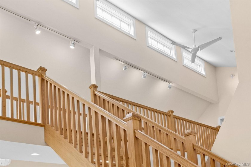 Set on a private 1.18-acre property in Hampton Bays, this - photo 25