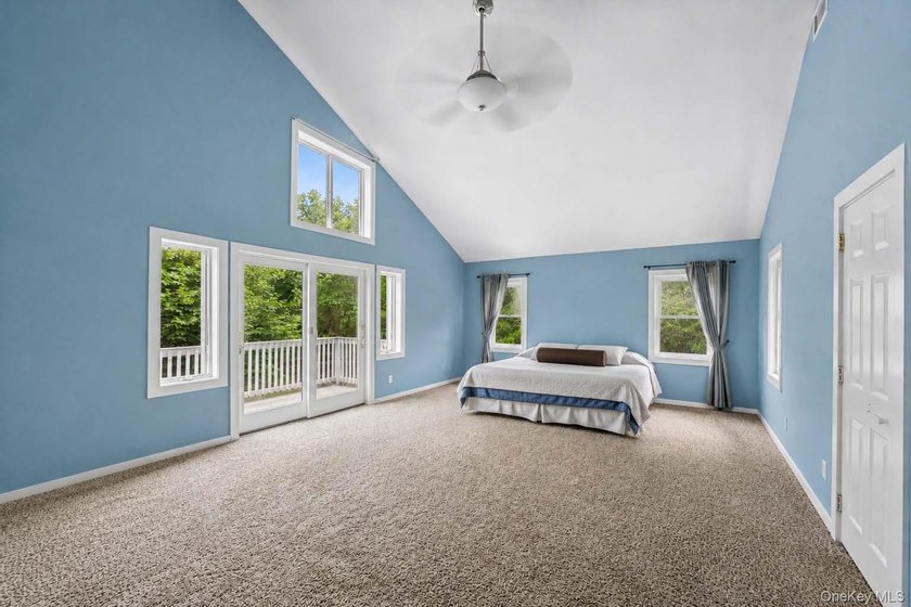 Set on a private 1.18-acre property in Hampton Bays, this - photo 28