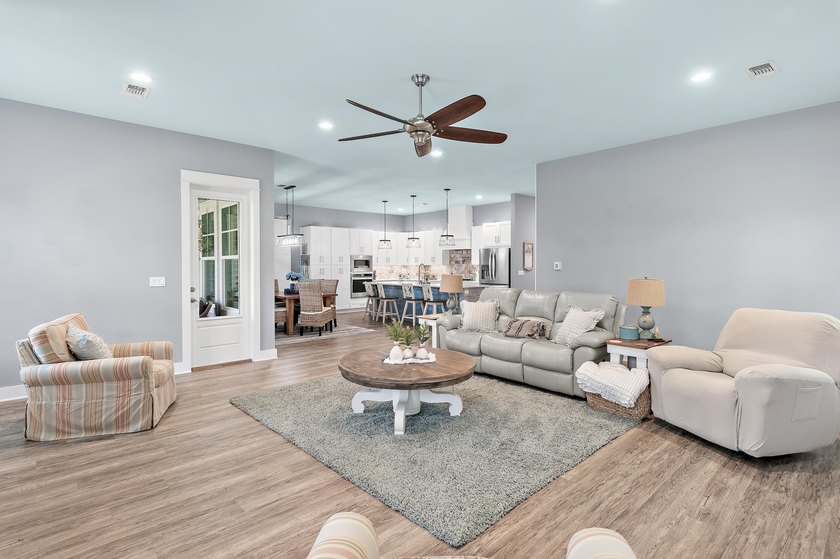 Escape to effortless coastal living in this bright and airy - photo 4