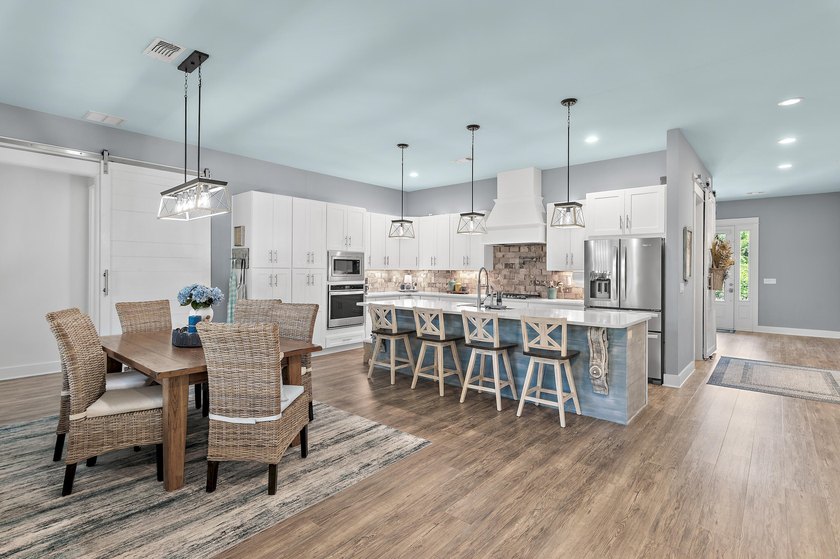 Escape to effortless coastal living in this bright and airy - photo 6