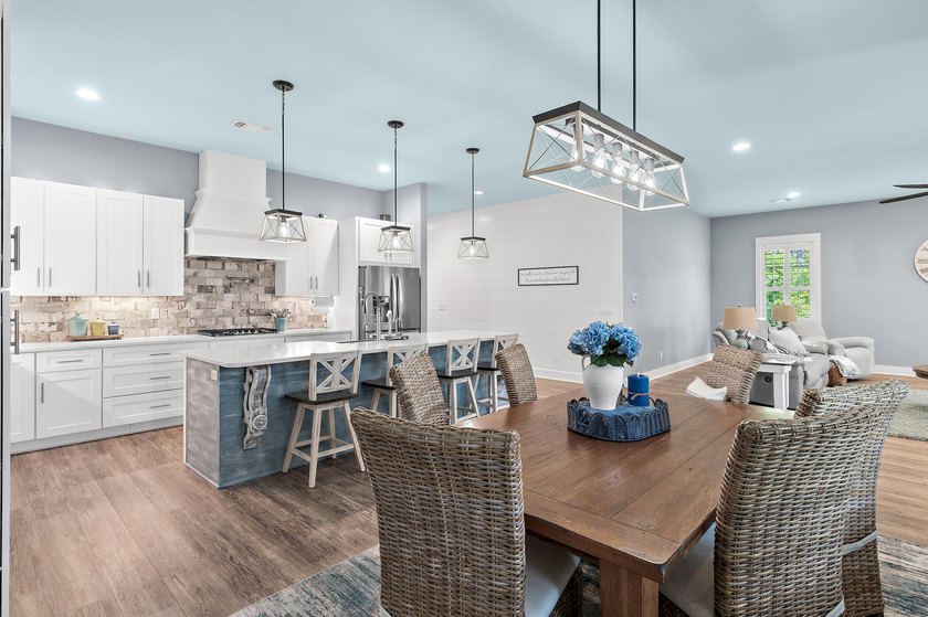 Escape to effortless coastal living in this bright and airy - photo 8