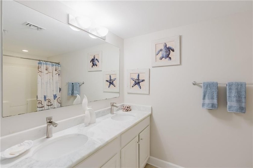 Welcome to Sanibel, where coastal luxury and convenience meet in - photo 9