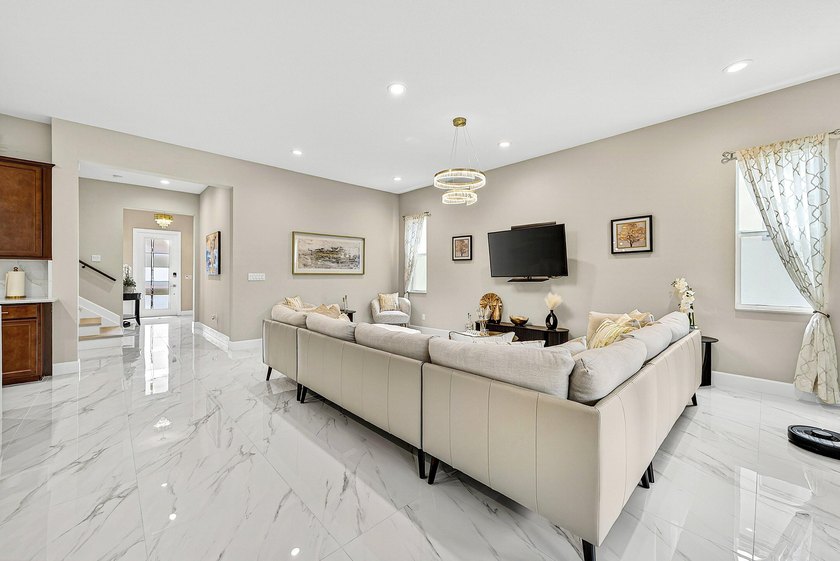 This beautifully updated 5-bedroom, 4-bath home offers the - photo 8