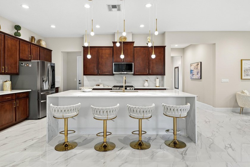 This beautifully updated 5-bedroom, 4-bath home offers the - photo 10