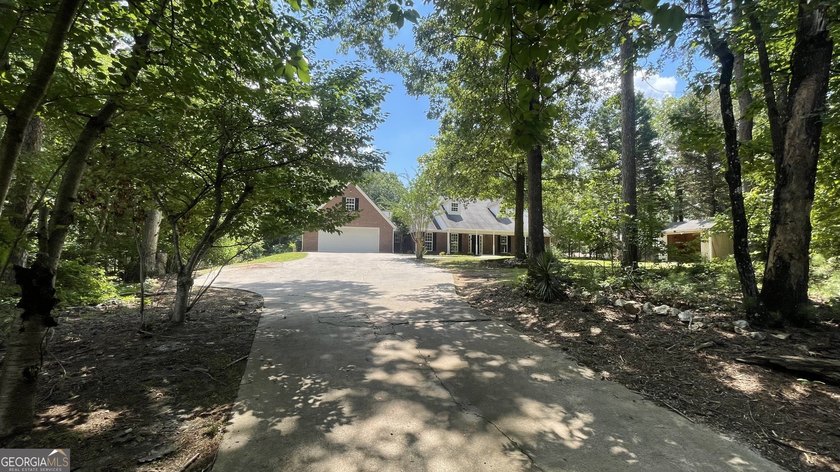 Welcome home to this stately 4-sided brick ranch tucked away on - photo 13