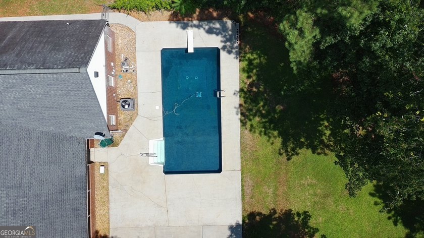 Welcome home to this stately 4-sided brick ranch tucked away on - photo 15