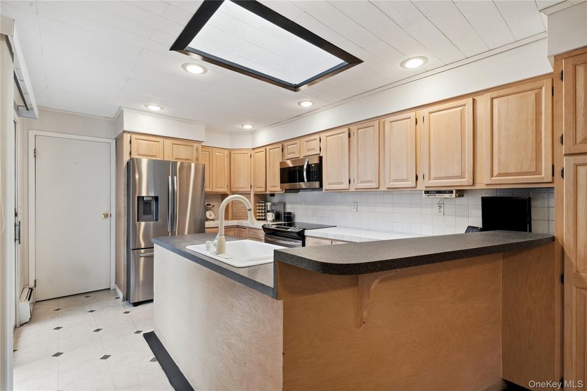 Located on a beautiful flat half-acre of property, this - photo 17