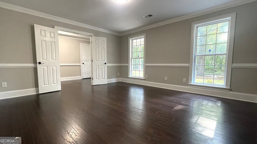 Welcome home to this stately 4-sided brick ranch tucked away on - photo 22