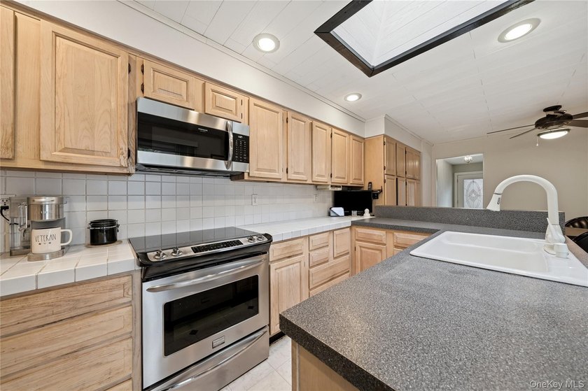 Located on a beautiful flat half-acre of property, this - photo 22