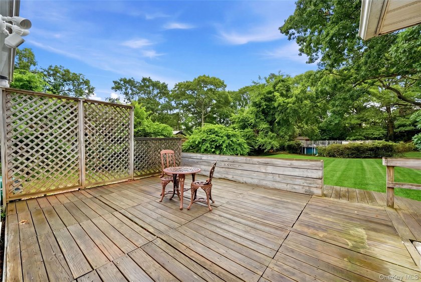 Located on a beautiful flat half-acre of property, this - photo 23