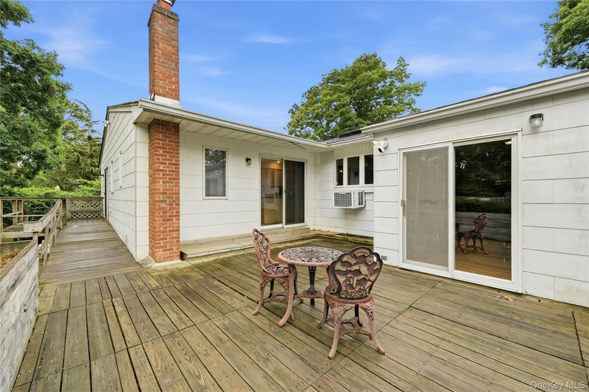 Located on a beautiful flat half-acre of property, this - photo 24