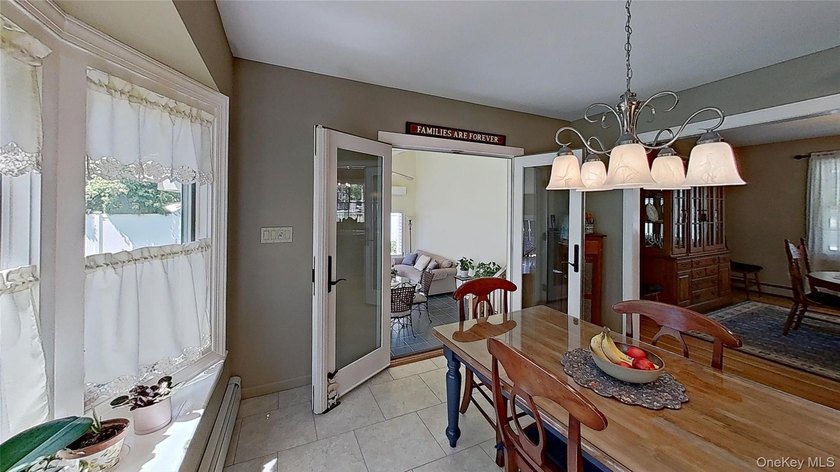 This stately residence is situated on a private street, north of - photo 8