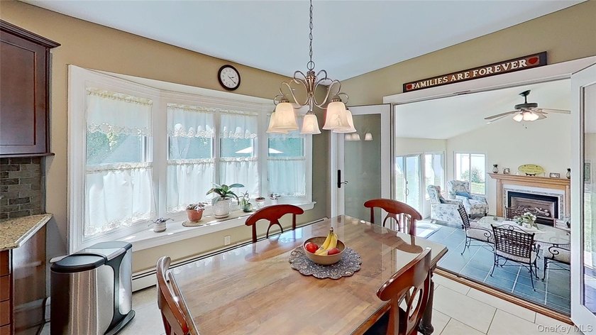 This stately residence is situated on a private street, north of - photo 9
