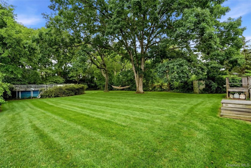 Located on a beautiful flat half-acre of property, this - photo 36