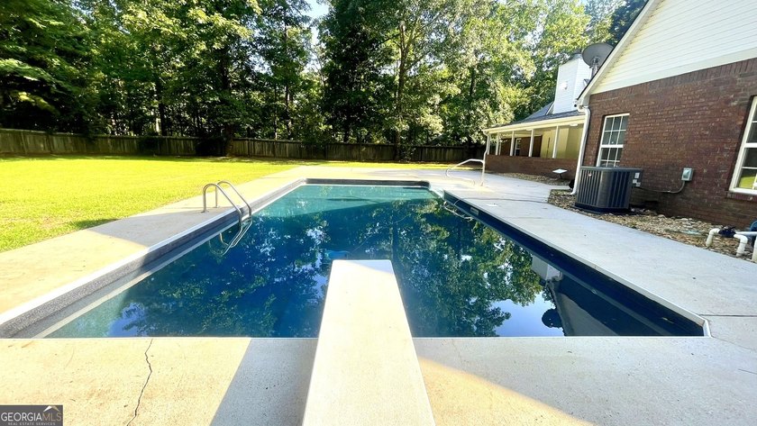 Welcome home to this stately 4-sided brick ranch tucked away on - photo 37