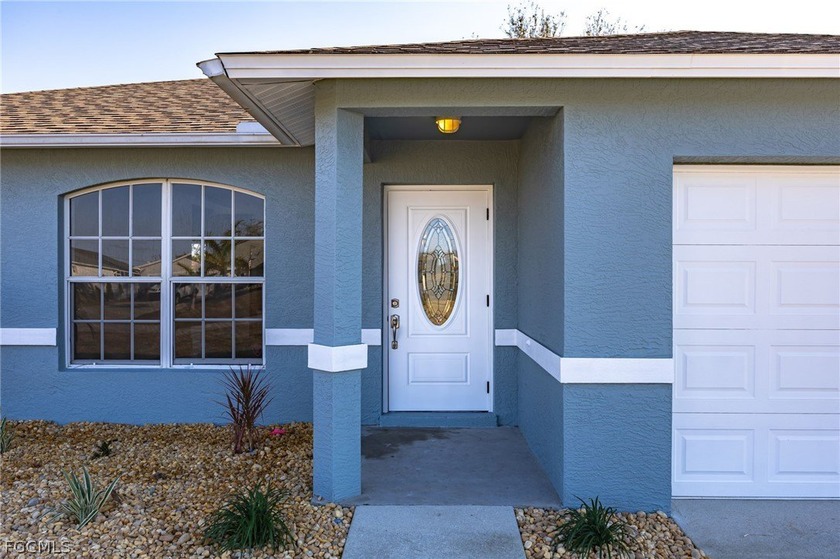 Nestled in NW Cape Coral, this beautifully refreshed 3-bedroom - photo 2