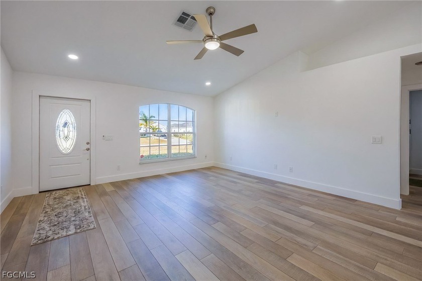 Nestled in NW Cape Coral, this beautifully refreshed 3-bedroom - photo 4