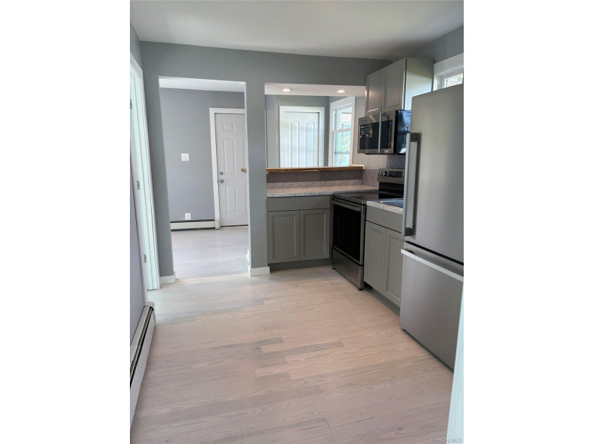 Completely newly renovated two bedroom, one bath Ranch with open - photo 9