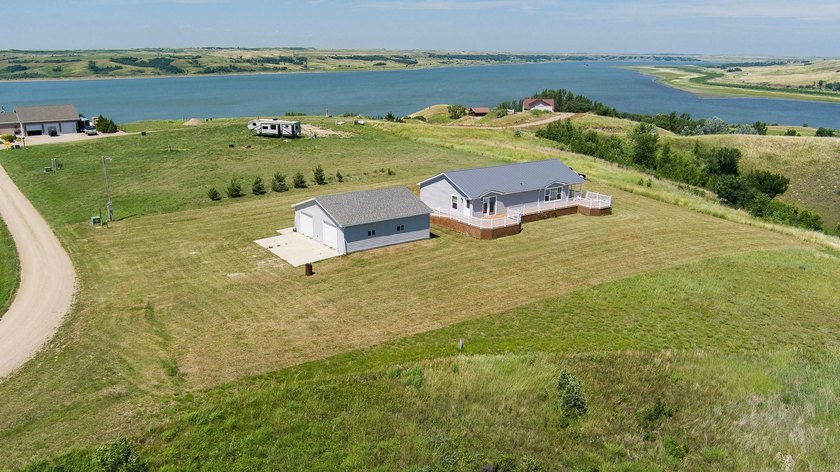 Whether you're searching for a year-round residence or the - photo 2