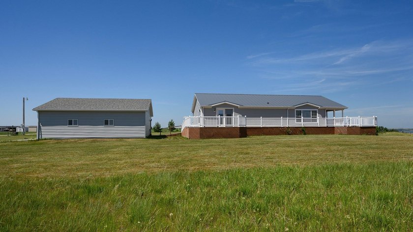 Whether you're searching for a year-round residence or the - photo 3
