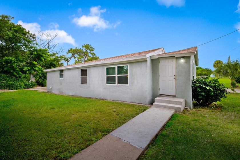 Fully renovated home in the heart of Fort Pierce! This 3-bedroom - photo 3
