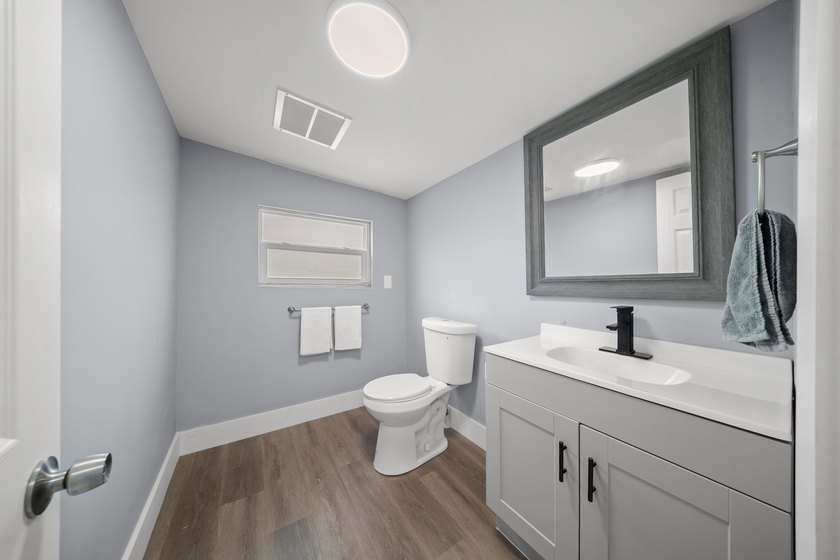 Fully renovated home in the heart of Fort Pierce! This 3-bedroom - photo 6
