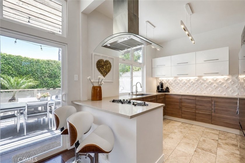 Situated in the coveted Huntington Harbour community, this - photo 16