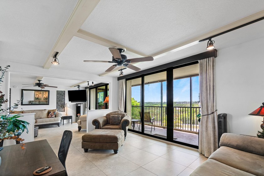 This turn key spacious 3 bedroom 3 bath top floor end unit is - photo 16