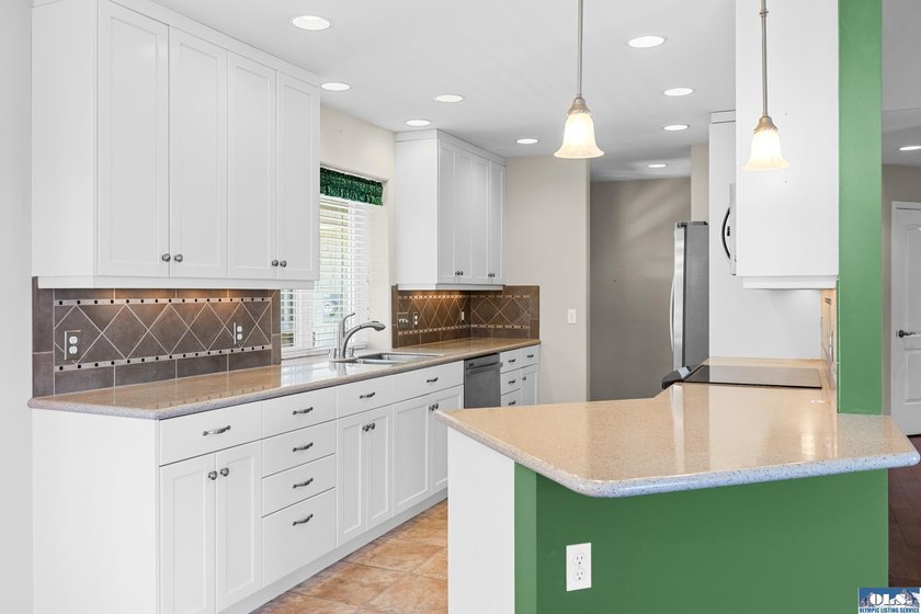 Welcome home to this beautifully maintained 3 bedroom, 2 bath - photo 13