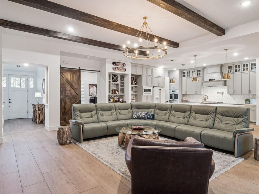 LUXURY Farmhouse PERFECTION! Stunning views of Lake Apopka await - photo 9