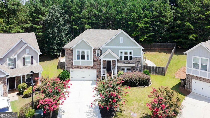 Welcome home to this like-new split-level beauty nestled on a - photo 2