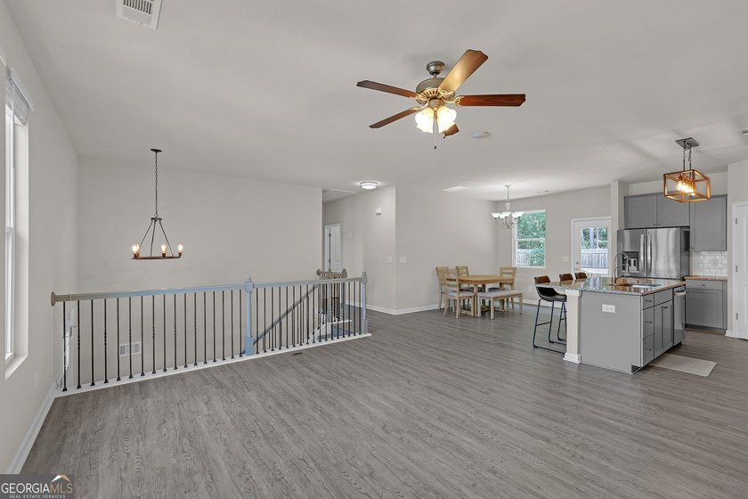 Welcome home to this like-new split-level beauty nestled on a - photo 7