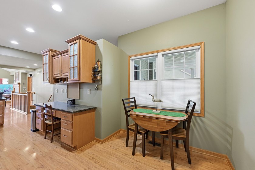 Stunning ranch condo in Waters Edge! Main level offers a - photo 11