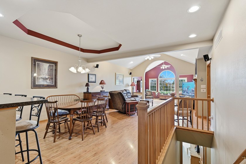Stunning ranch condo in Waters Edge! Main level offers a - photo 12