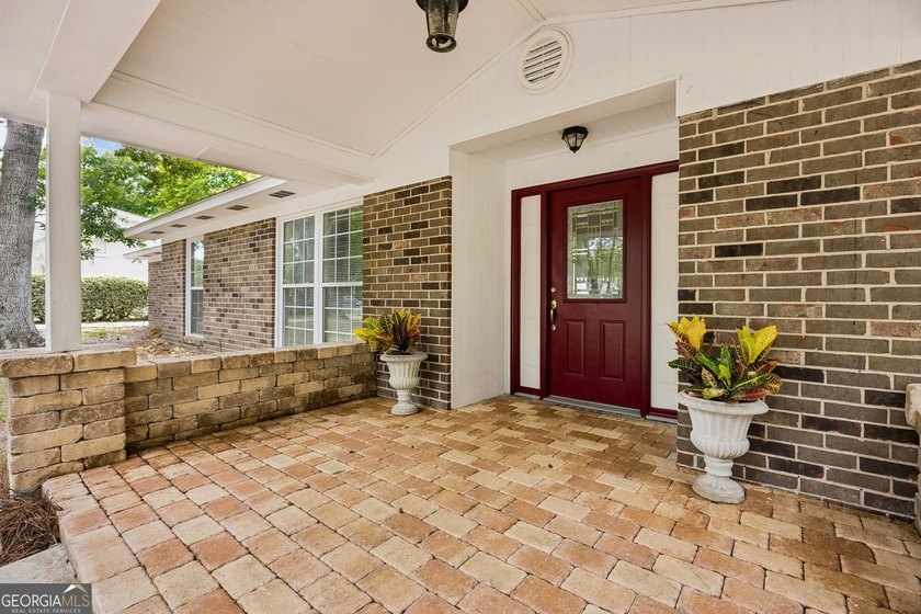 Two homes. One lot. Endless possibilities. Enjoy the tree lined - photo 2