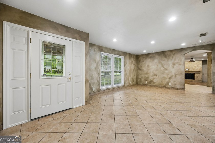 Two homes. One lot. Endless possibilities. Enjoy the tree lined - photo 7