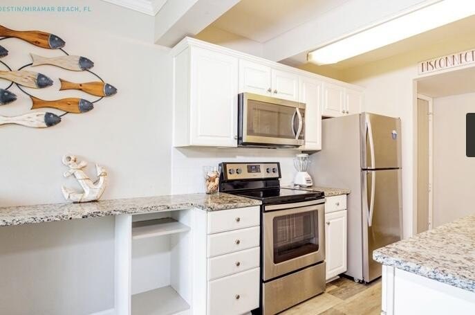 Come see this perfectly upgraded 3 bedroom/ 2 bath ground level - photo 2