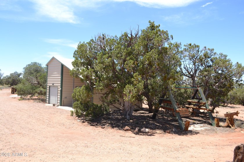 Enjoy country living on 4 fully fenced acres with plenty of room - photo 13