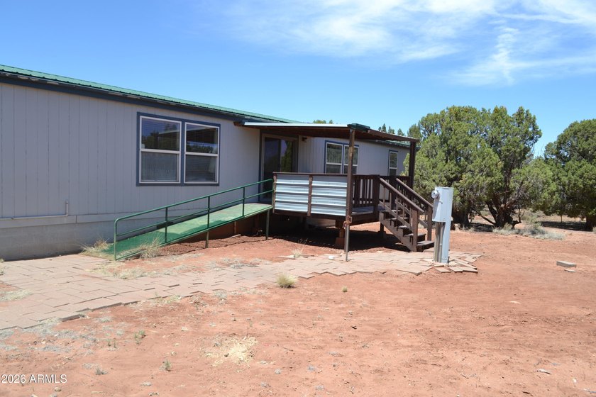 Enjoy country living on 4 fully fenced acres with plenty of room - photo 17