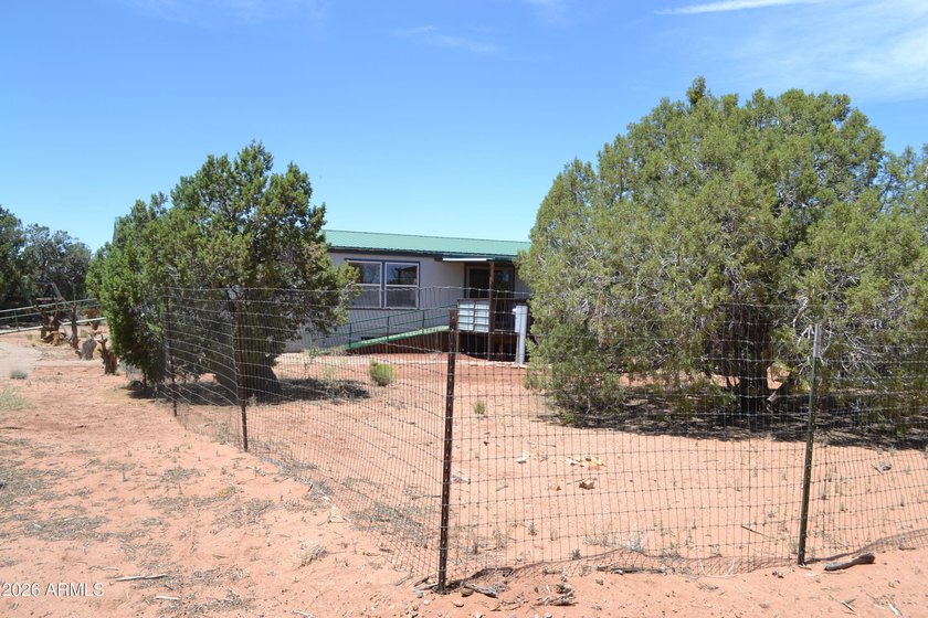Enjoy country living on 4 fully fenced acres with plenty of room - photo 19