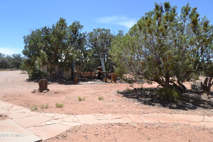 Enjoy country living on 4 fully fenced acres with plenty of room - photo 26