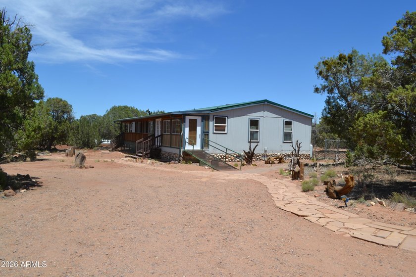 Enjoy country living on 4 fully fenced acres with plenty of room - photo 28