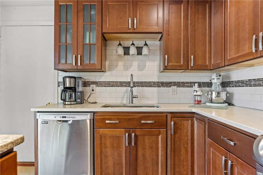 Welcome to your dream home nestled in the Town of Greece! This - photo 11