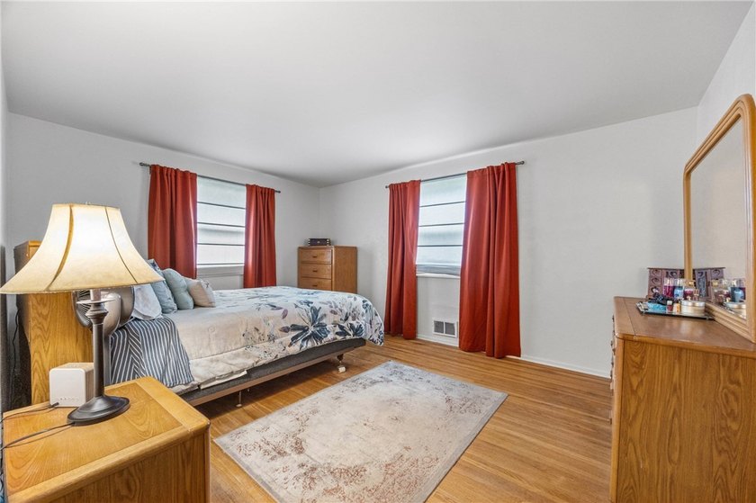 Welcome to your dream home nestled in the Town of Greece! This - photo 23