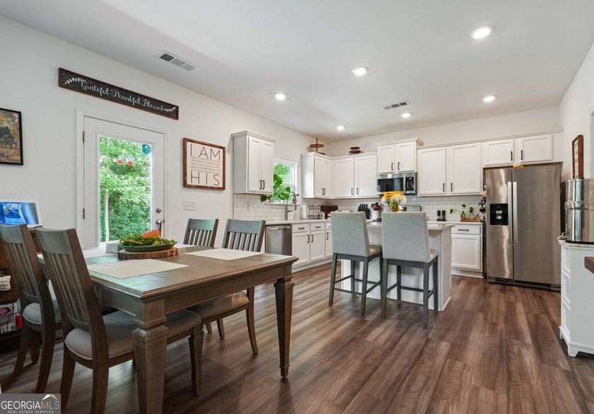 Privacy, peaceful wooded views, and modern construction come - photo 9