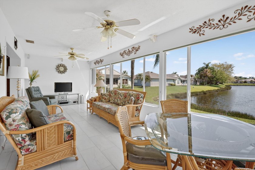 Enjoy stunning long lake views from sunrise to sunset in this - photo 2