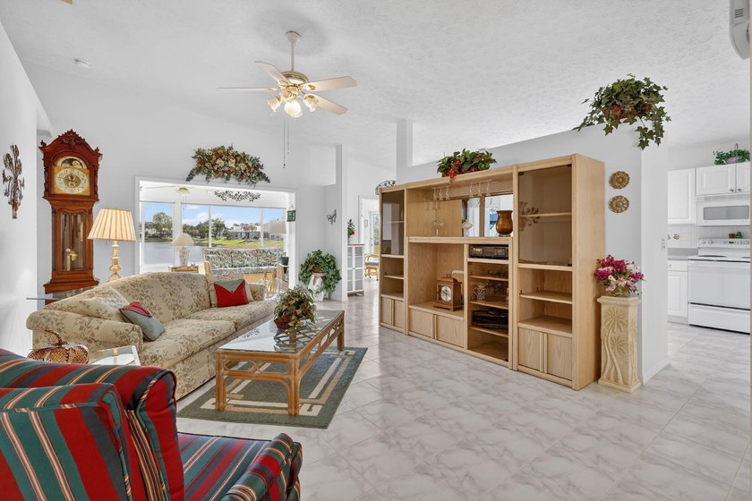 Enjoy stunning long lake views from sunrise to sunset in this - photo 8