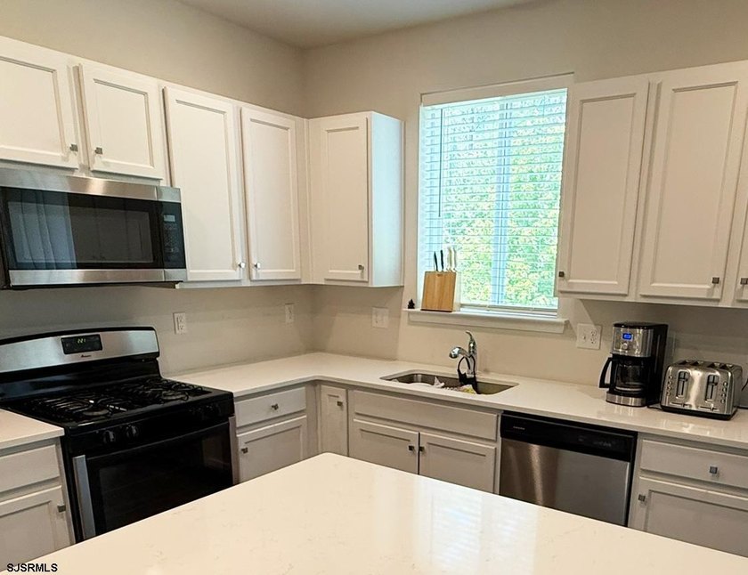 Welcome to this outstanding 4-bedroom, 2 full bath plus powder - photo 3