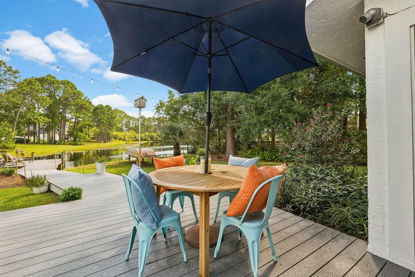 Nestled on a private one-acre homesite overlooking the tranquil - photo 4