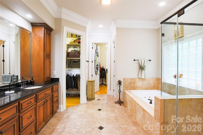 Your private sanctuary awaits in this custom-built brick and - photo 17